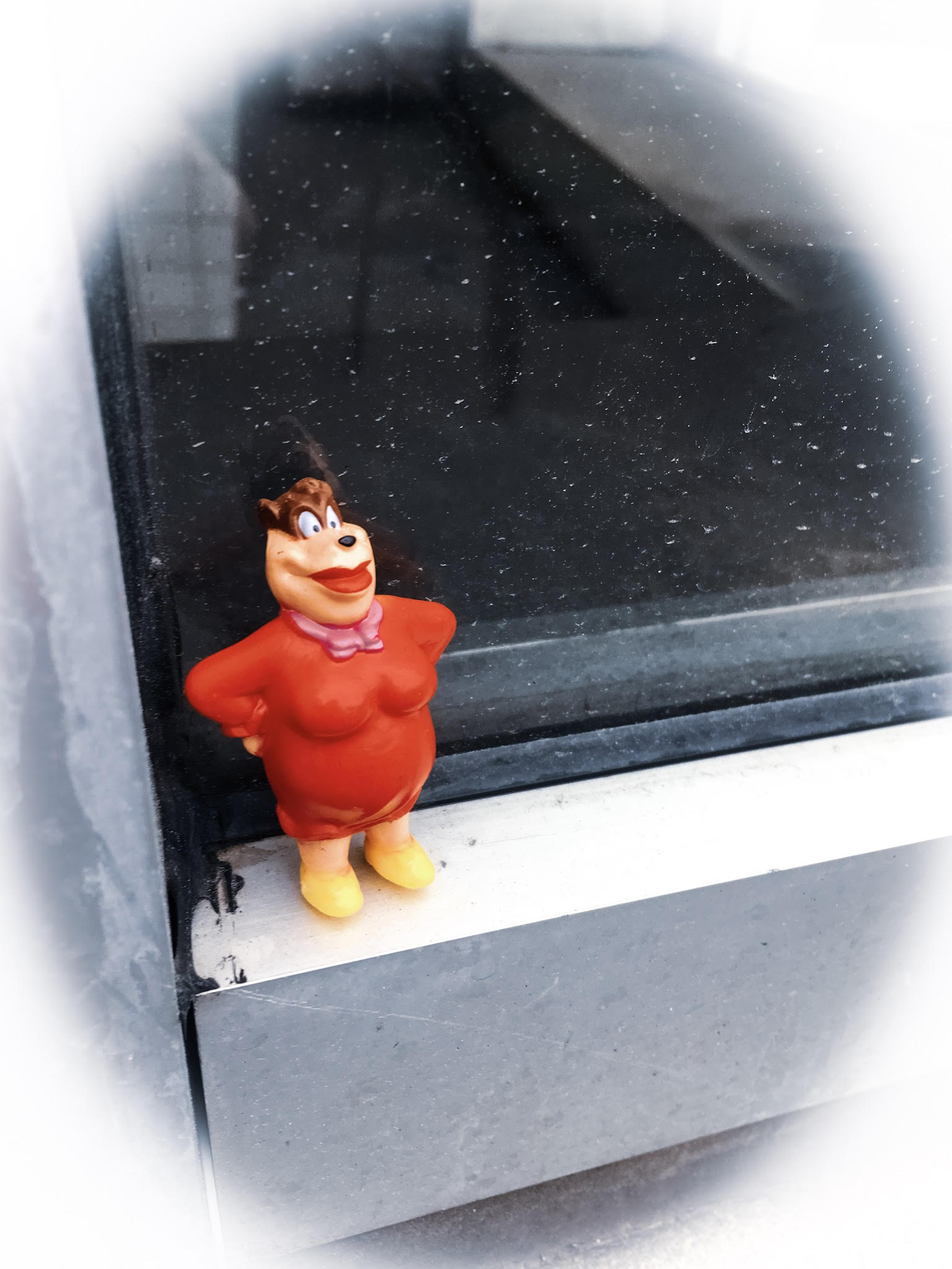 Picture of toy leaning against a window