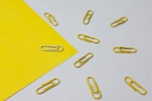 yellow and white paper clips