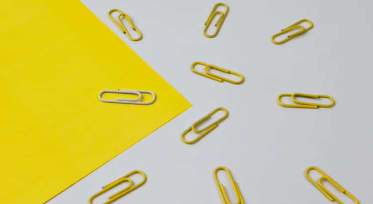 yellow and white paper clips