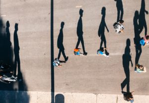 silhouette of people walking