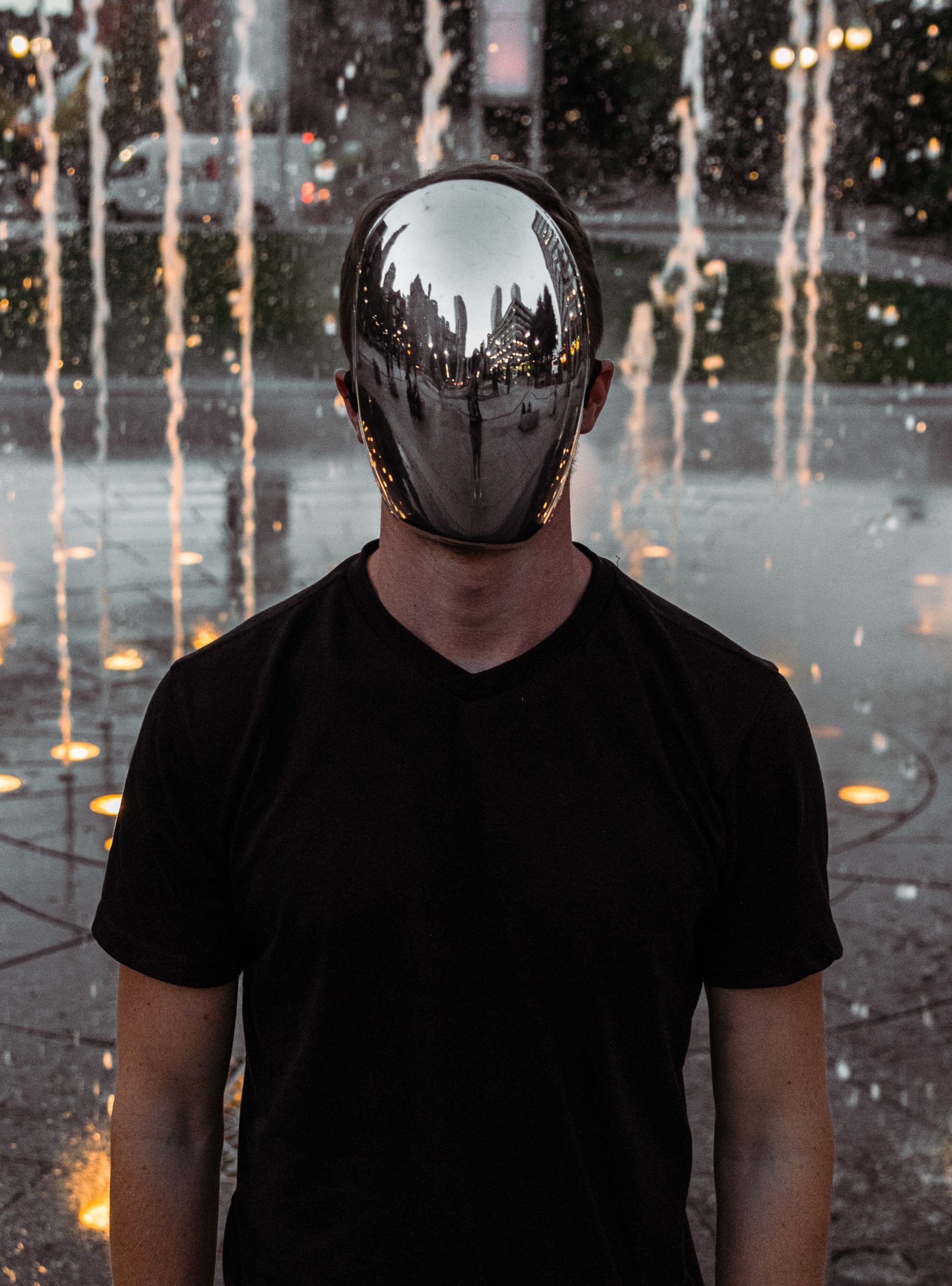 man wearing a mirror mask